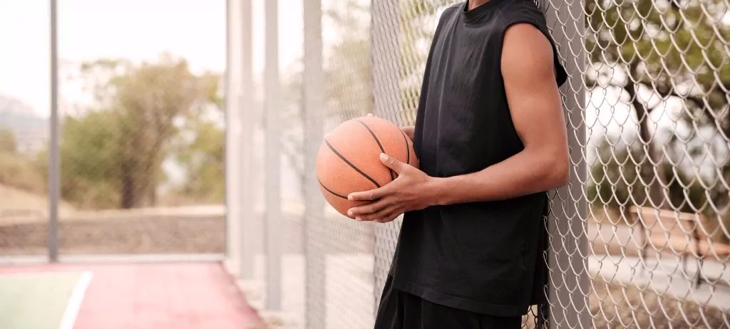 man holding a basketball
