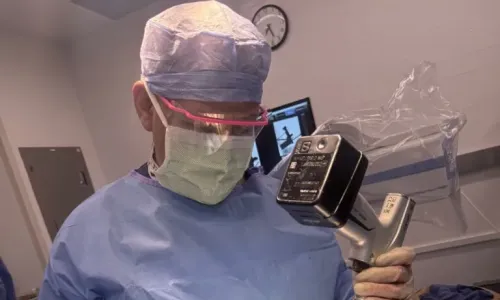 Photo: Dr. Nicholas Abidi performing surgery