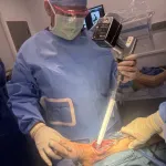 Photo: Dr. Nicholas Abidi performing surgery