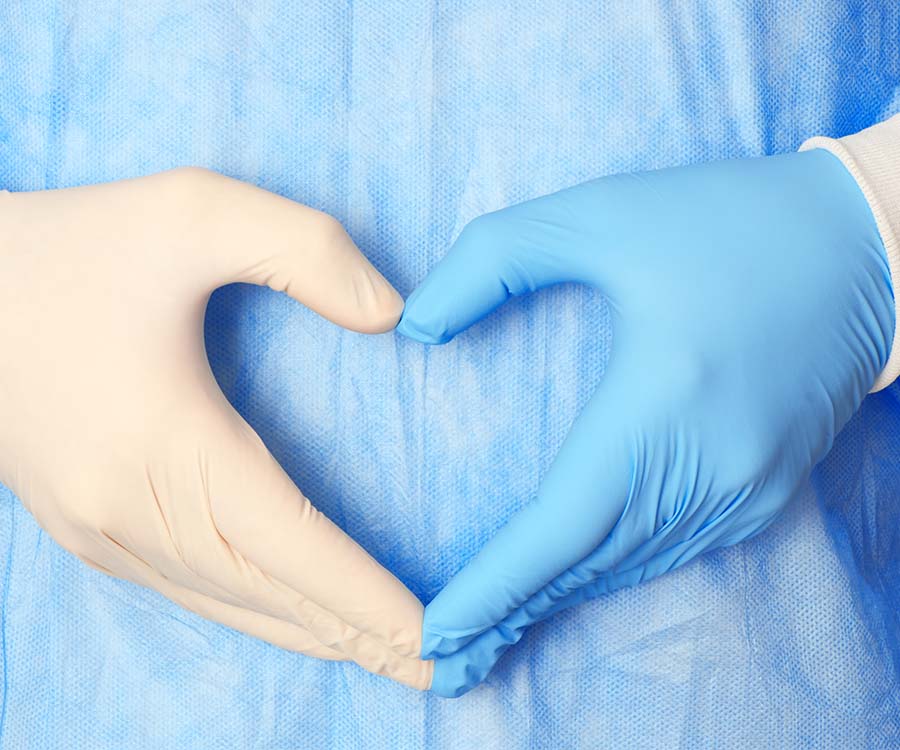 Doctor making heart shape