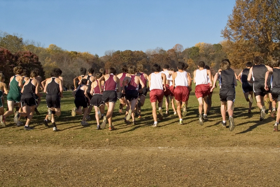 track team running in a park