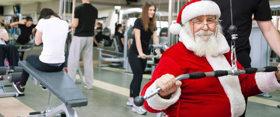 Santa Claus working out at the gym.