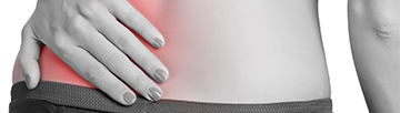 Hand on lower back in pain